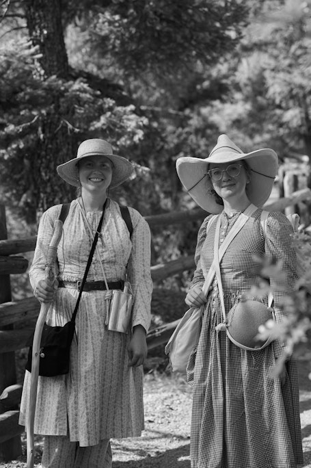 portrait of two women in vintage early 20th century replica clothing on Barr Trail near Colorado Springs, hiking up Pikes Peak
