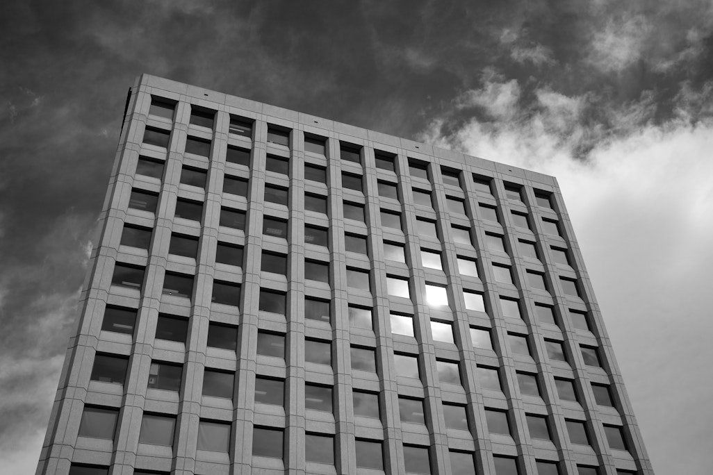 looking up at featureless windows of an office building in Colorado Springs