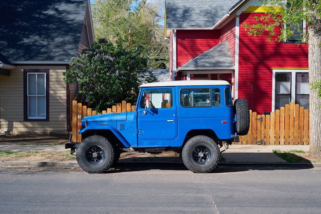 an old blue Toyota Landcruiser in Old Colorado City