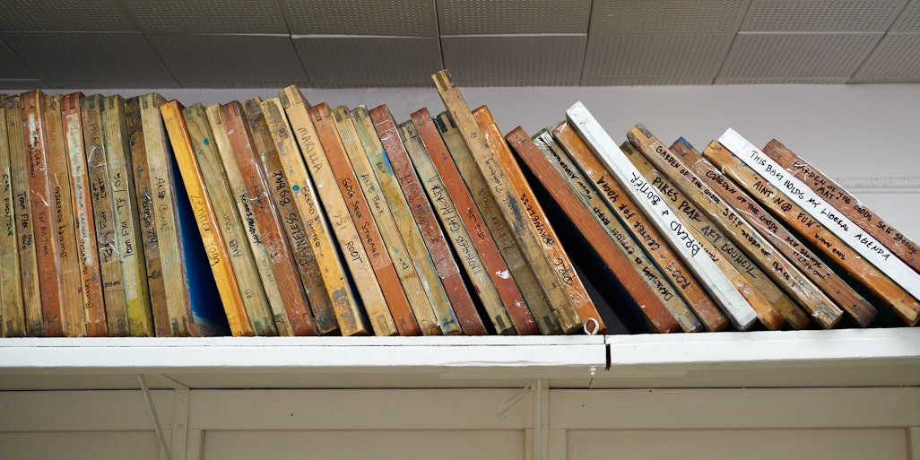 a rack of screen printing frames at Groovy Print Shop